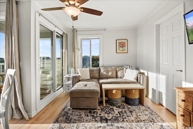 9400 Shore Dr Unit 409, Myrtle Beach, SC 29572 - sitting room with ornamental molding, light wood-style floors, and ceiling fan