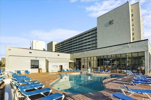 9400 Shore Dr Unit 409, Myrtle Beach, SC 29572 - community pool with a patio