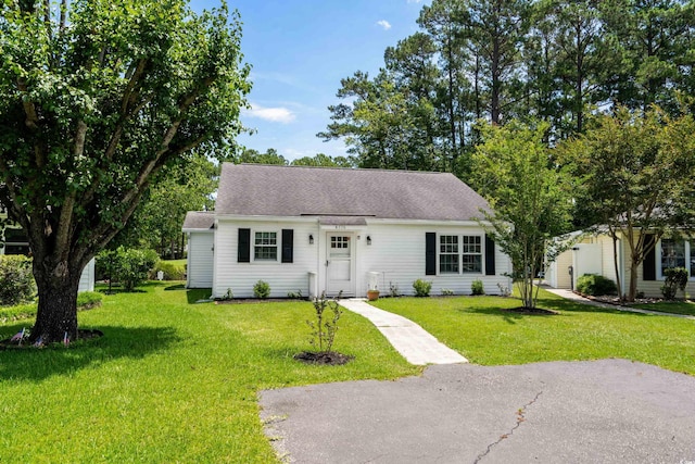 6576 Pebble Beach Cres, Myrtle Beach, SC 29588 - view of front of home with a front lawn and roof with shingles