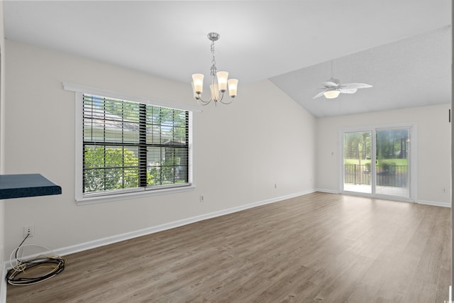6576 Pebble Beach Cres, Myrtle Beach, SC 29588 - spare room with plenty of natural light, wood finished floors, a chandelier, and vaulted ceiling