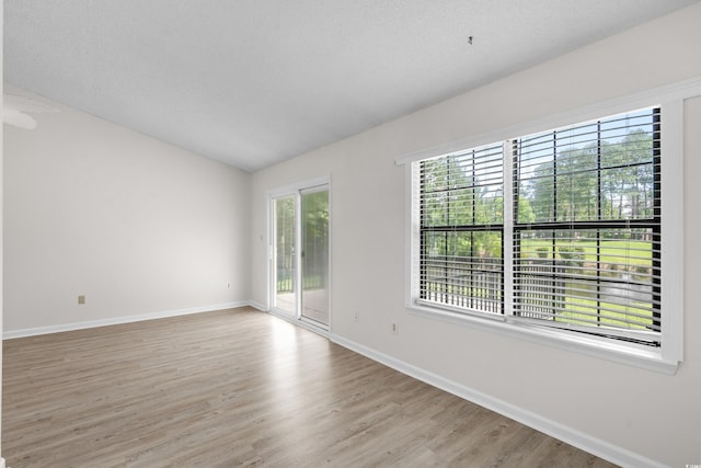 6576 Pebble Beach Cres, Myrtle Beach, SC 29588 - unfurnished room featuring lofted ceiling and light wood finished floors
