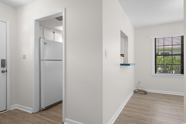 6576 Pebble Beach Cres, Myrtle Beach, SC 29588 - hallway with light wood-style floors and baseboards