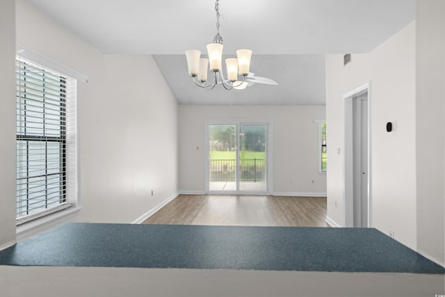 6576 Pebble Beach Cres, Myrtle Beach, SC 29588 - unfurnished room with wood finished floors and a chandelier