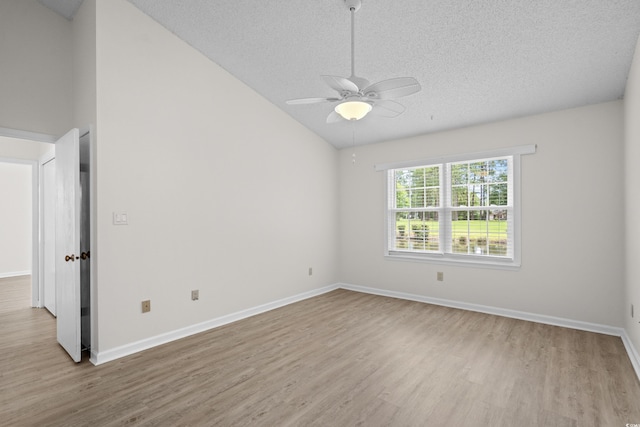 6576 Pebble Beach Cres, Myrtle Beach, SC 29588 - unfurnished room with wood finished floors, a ceiling fan, vaulted ceiling, and a textured ceiling