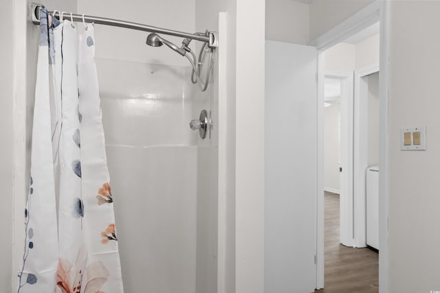 6576 Pebble Beach Cres, Myrtle Beach, SC 29588 - bathroom featuring curtained shower and wood finished floors