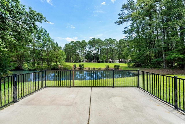 6576 Pebble Beach Cres, Myrtle Beach, SC 29588 - view of patio / terrace featuring a water view and view of wooded area