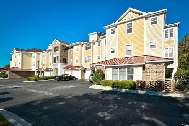 5650 Barefoot Resort Bridge Rd Unit 431, North Myrtle Beach, SC 29582 - view of building exterior with a residential view