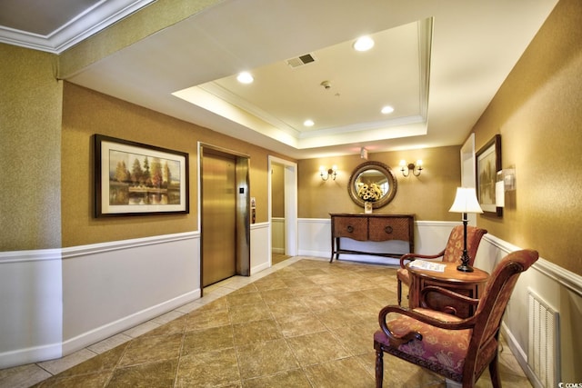 5650 Barefoot Resort Bridge Rd Unit 431, North Myrtle Beach, SC 29582 - hall featuring elevator, ornamental molding, a tray ceiling, a wainscoted wall, and tile patterned floors