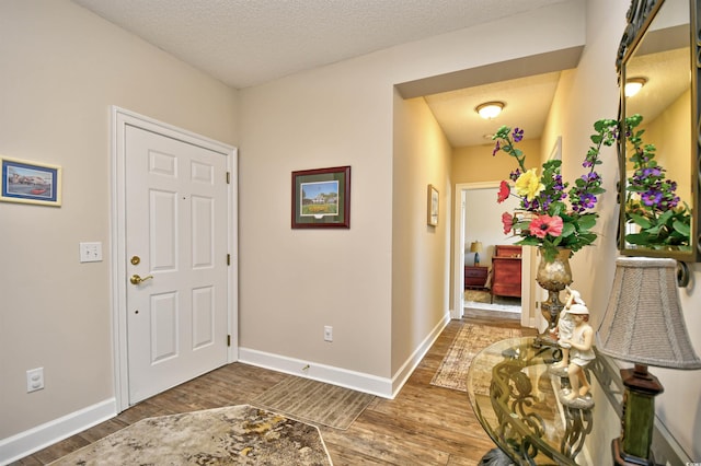5650 Barefoot Resort Bridge Rd Unit 431, North Myrtle Beach, SC 29582 - foyer featuring wood finished floors and a textured ceiling