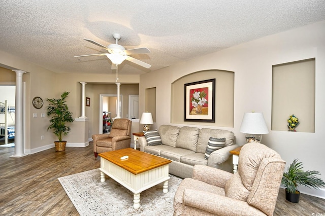 5650 Barefoot Resort Bridge Rd Unit 431, North Myrtle Beach, SC 29582 - living area featuring wood finished floors, ceiling fan, decorative columns, and a textured ceiling