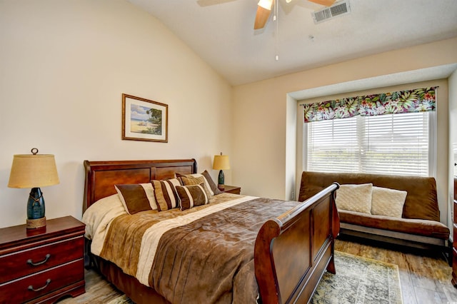 5650 Barefoot Resort Bridge Rd Unit 431, North Myrtle Beach, SC 29582 - bedroom featuring vaulted ceiling, wood finished floors, and ceiling fan