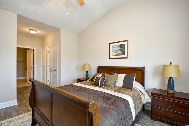 5650 Barefoot Resort Bridge Rd Unit 431, North Myrtle Beach, SC 29582 - bedroom featuring dark wood-style flooring, lofted ceiling, and ceiling fan