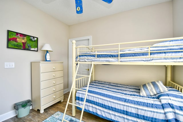 5650 Barefoot Resort Bridge Rd Unit 431, North Myrtle Beach, SC 29582 - bedroom with wood finished floors and ceiling fan
