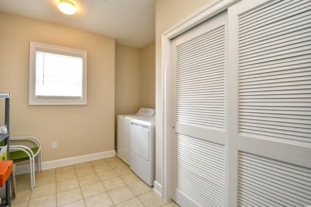 5650 Barefoot Resort Bridge Rd Unit 431, North Myrtle Beach, SC 29582 - washroom featuring separate washer and dryer and light tile patterned flooring