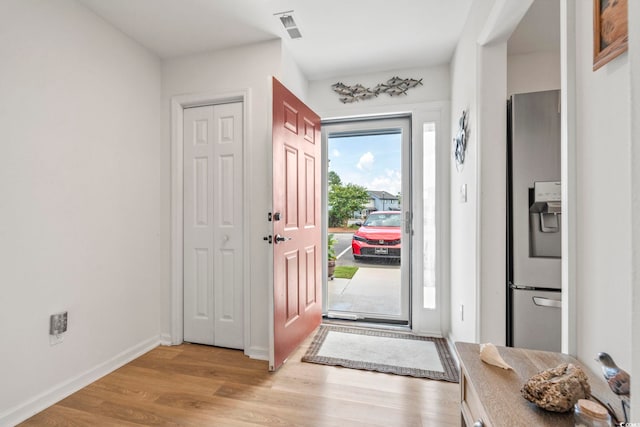 775 Plantation Dr Unit 53, Little River, SC 29566 - entrance foyer featuring light wood finished floors and baseboards