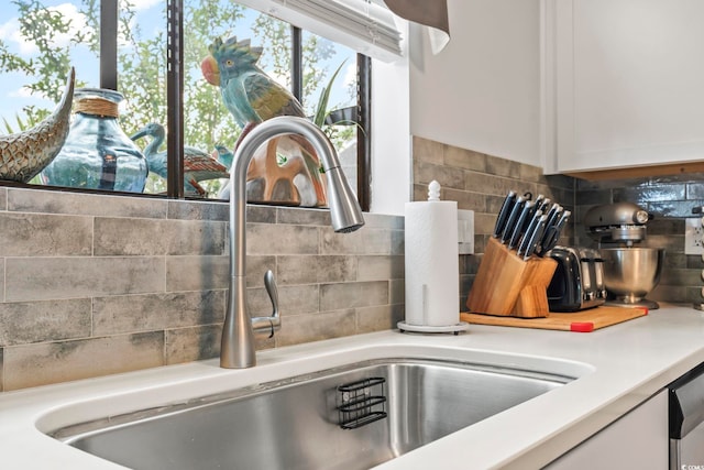 775 Plantation Dr Unit 53, Little River, SC 29566 - kitchen view of white cabinetry, light countertops, and backsplash