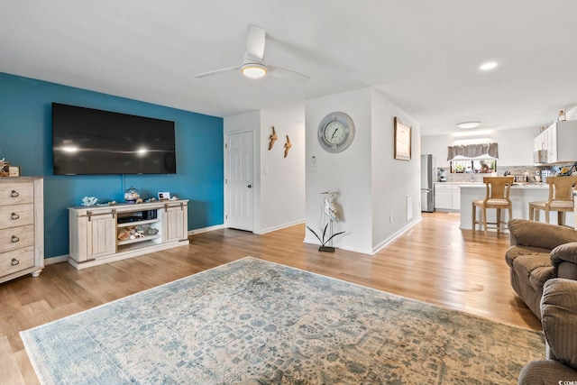 775 Plantation Dr Unit 53, Little River, SC 29566 - living area with light wood-type flooring and a ceiling fan