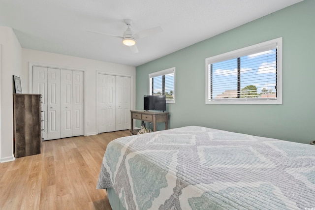 775 Plantation Dr Unit 53, Little River, SC 29566 - bedroom featuring wood finished floors, two closets, and ceiling fan