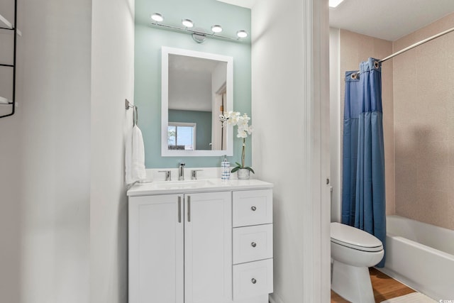 775 Plantation Dr Unit 53, Little River, SC 29566 - full bathroom with shower / bath combo with shower curtain, vanity, and wood finished floors