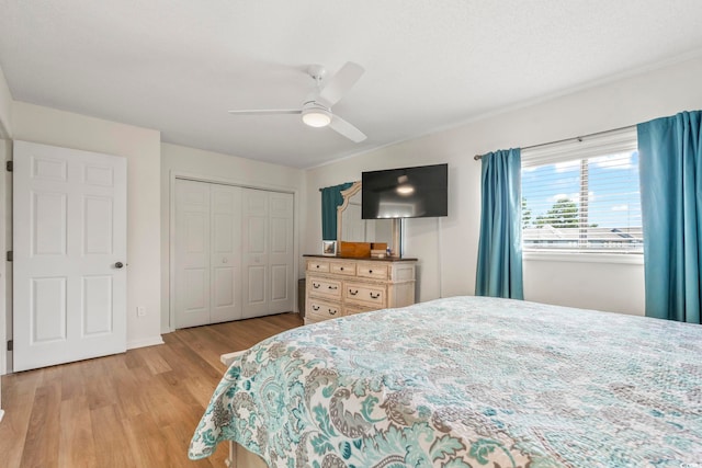 775 Plantation Dr Unit 53, Little River, SC 29566 - bedroom with light wood-style flooring, a ceiling fan, and a closet