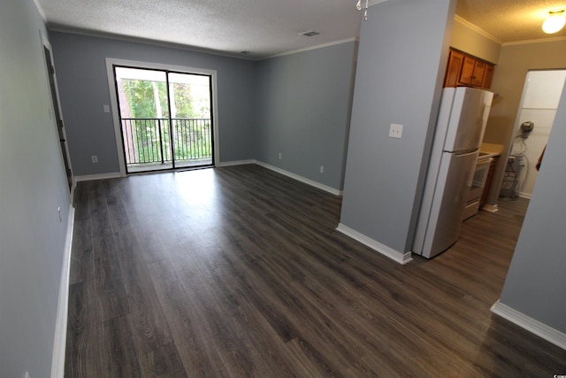 950 Forestbrook Rd Unit B-8, Myrtle Beach, SC 29588 - spare room featuring a textured ceiling, ornamental molding, and dark wood-style floors