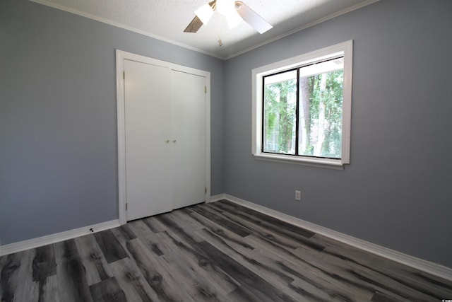 950 Forestbrook Rd Unit B-8, Myrtle Beach, SC 29588 - unfurnished bedroom featuring ornamental molding, wood finished floors, a closet, a ceiling fan, and a textured ceiling