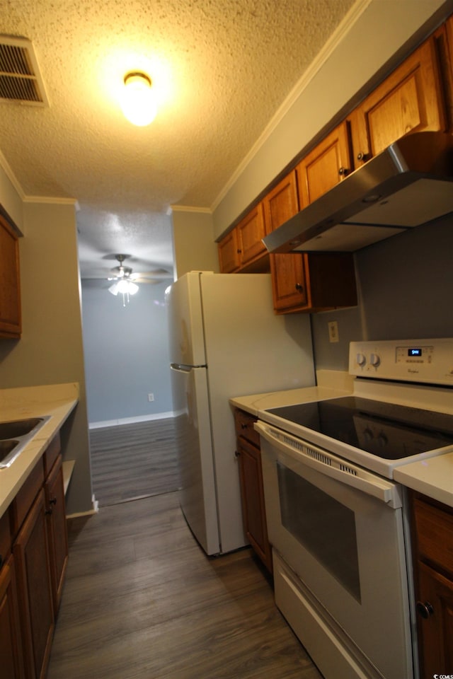 950 Forestbrook Rd Unit B-8, Myrtle Beach, SC 29588 - kitchen with electric stove, a textured ceiling, ornamental molding, ceiling fan, and brown cabinetry