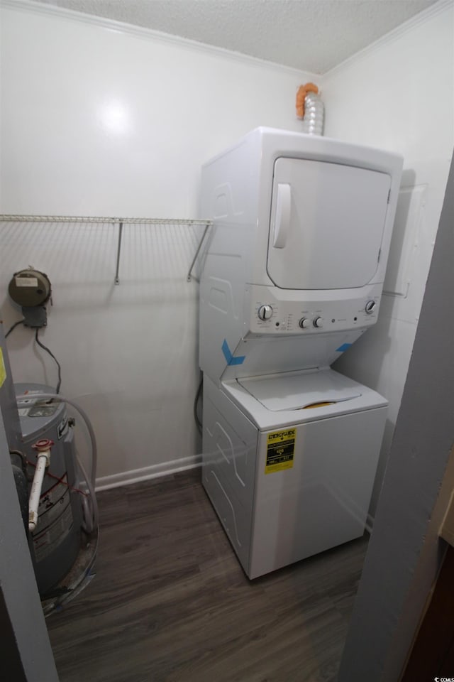 950 Forestbrook Rd Unit B-8, Myrtle Beach, SC 29588 - laundry area with stacked washing machine and dryer, dark wood-type flooring, and crown molding