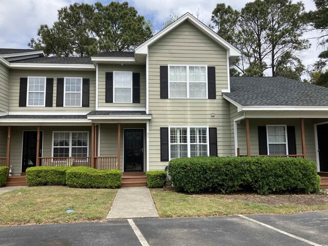 4840 Moss Creek Loop Unit 31, Murrells Inlet, SC 29576 - townhome / multi-family property with a porch and roof with shingles