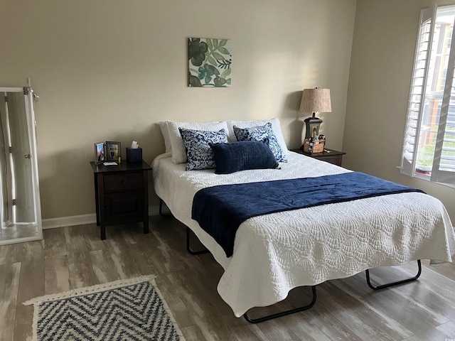 4840 Moss Creek Loop Unit 31, Murrells Inlet, SC 29576 - bedroom with wood finished floors and baseboards