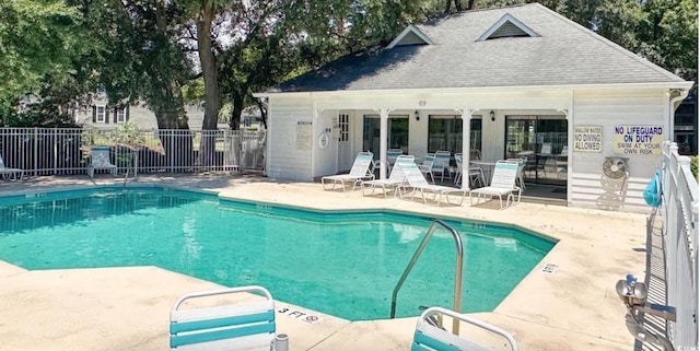 4840 Moss Creek Loop Unit 31, Murrells Inlet, SC 29576 - community pool with a patio area, an outbuilding, and a storage structure