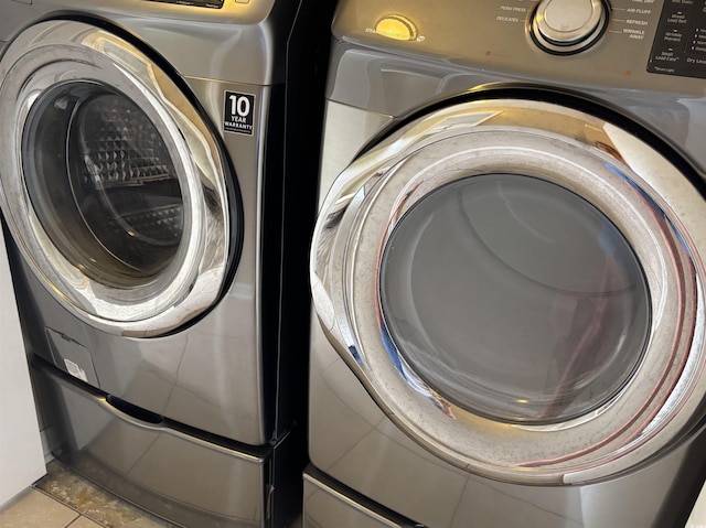 4840 Moss Creek Loop Unit 31, Murrells Inlet, SC 29576 - laundry area with washer / dryer and tile patterned floors