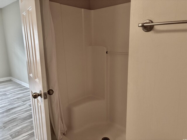 4840 Moss Creek Loop Unit 31, Murrells Inlet, SC 29576 - bathroom featuring a shower and wood finished floors