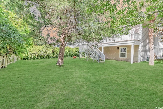 5 Tiara Ln, Murrells Inlet, SC 29576 - view of yard featuring stairs and a wooden deck