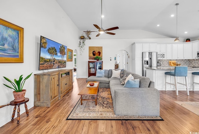 5 Tiara Ln, Murrells Inlet, SC 29576 - living area with arched walkways, ceiling fan, light wood-style flooring, recessed lighting, and high vaulted ceiling
