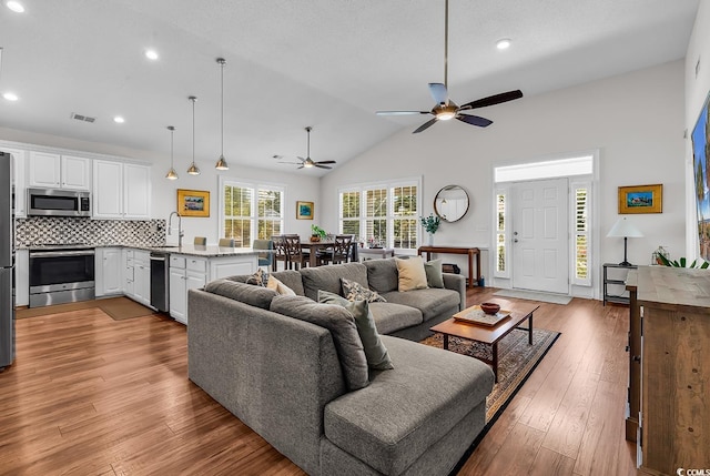 5 Tiara Ln, Murrells Inlet, SC 29576 - living room with ceiling fan, light wood finished floors, recessed lighting, and lofted ceiling