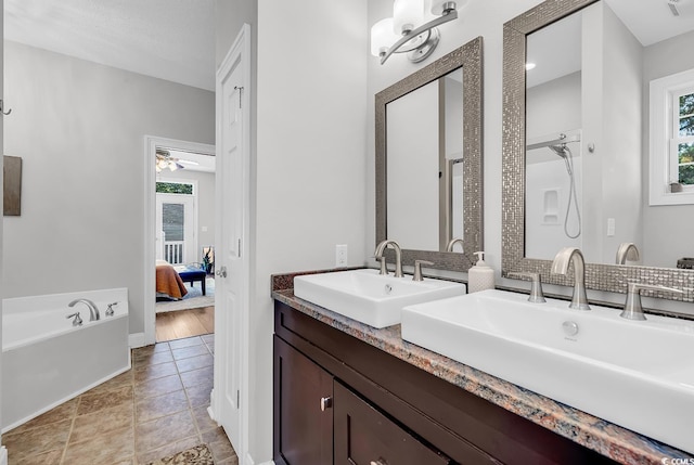 5 Tiara Ln, Murrells Inlet, SC 29576 - full bath with plenty of natural light, double vanity, tile patterned floors, and a bath