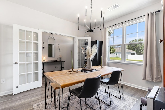 651 Choctaw Dr, Conway, SC 29526 - dining room with a chandelier and wood finished floors