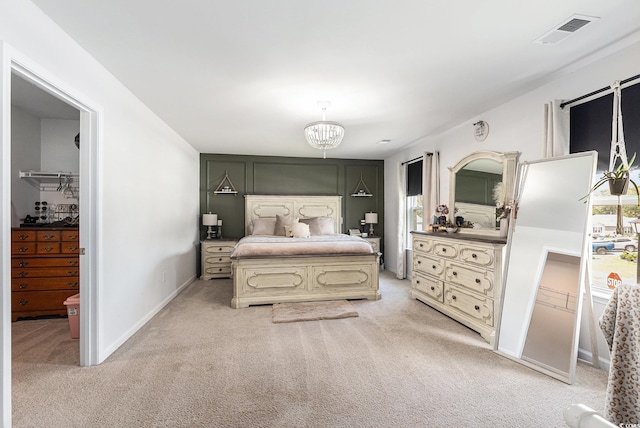 651 Choctaw Dr, Conway, SC 29526 - bedroom with light carpet and a chandelier