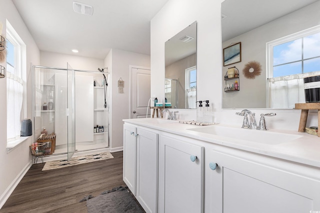 651 Choctaw Dr, Conway, SC 29526 - full bathroom featuring a stall shower, wood finished floors, double vanity, and recessed lighting