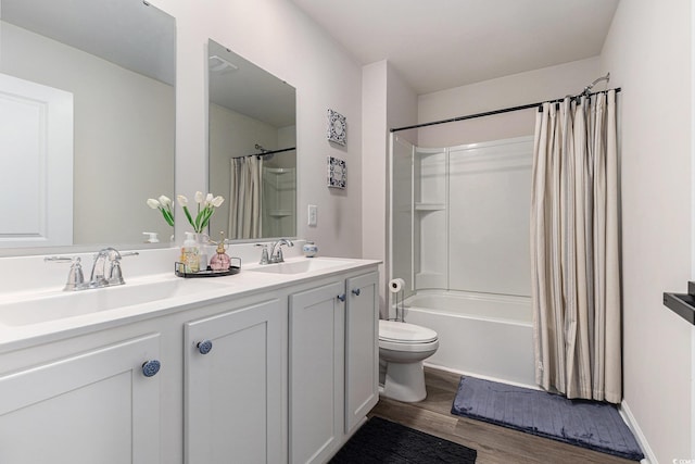 651 Choctaw Dr, Conway, SC 29526 - full bath with wood finished floors, double vanity, and shower / tub combo with curtain