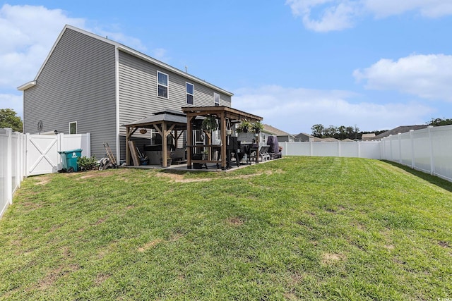 651 Choctaw Dr, Conway, SC 29526 - back of house featuring a gazebo, a fenced backyard, and a patio area