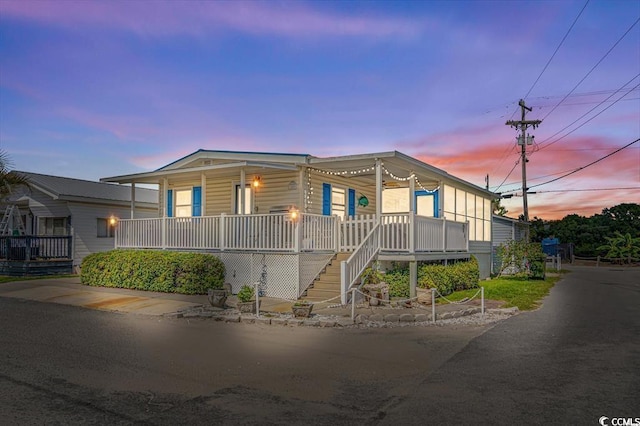 6001-1459 S Kings Hwy, Myrtle Beach, SC 29575 - manufactured / mobile home with a porch and stairs