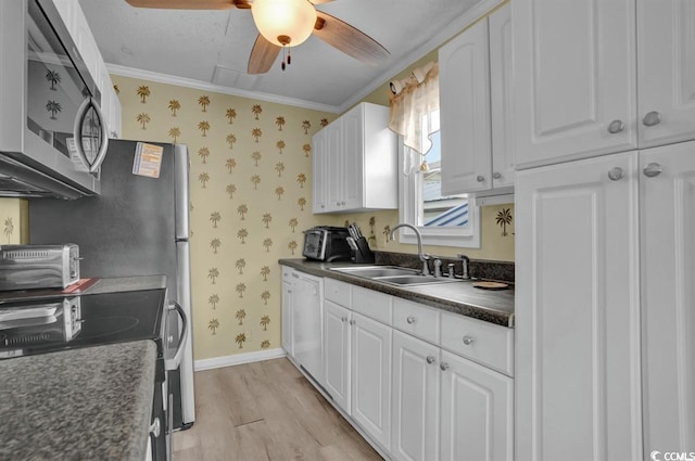 6001-1459 S Kings Hwy, Myrtle Beach, SC 29575 - kitchen featuring stainless steel microwave, electric stove, wallpapered walls, dark countertops, and white cabinets