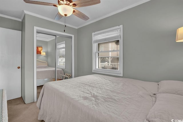 6001-1459 S Kings Hwy, Myrtle Beach, SC 29575 - bedroom with light colored carpet, crown molding, a closet, and a ceiling fan