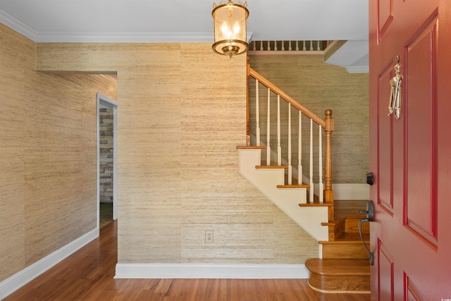 571 Fernwood Rd, Murrells Inlet, SC 29576 - entrance foyer with stairs, crown molding, wood finished floors, and wallpapered walls