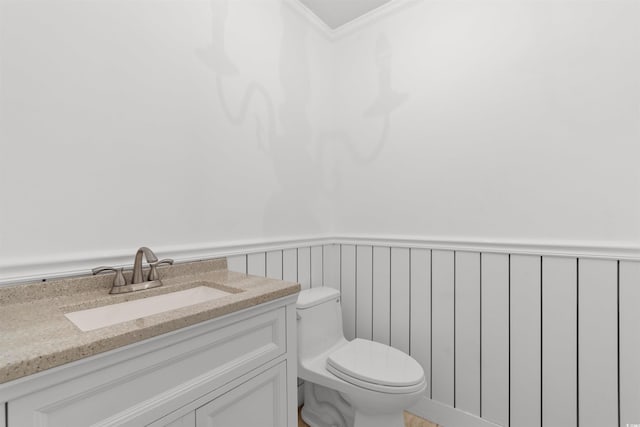 571 Fernwood Rd, Murrells Inlet, SC 29576 - half bathroom with ornamental molding, vanity, and wainscoting