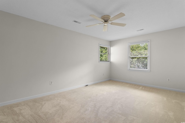 571 Fernwood Rd, Murrells Inlet, SC 29576 - carpeted empty room with baseboards and a ceiling fan