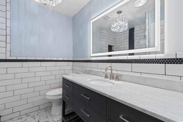 571 Fernwood Rd, Murrells Inlet, SC 29576 - full bathroom featuring a chandelier, tile walls, vanity, and a tile shower