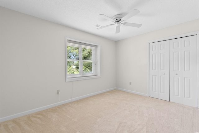 571 Fernwood Rd, Murrells Inlet, SC 29576 - unfurnished bedroom featuring carpet, a closet, and ceiling fan